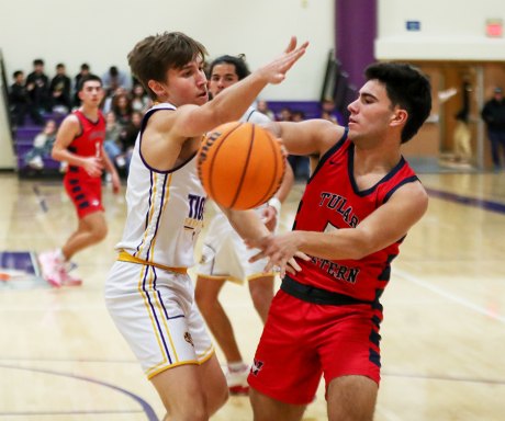 Lemoore's Logan Sais forces a bad pass in Friday's 67-53 win against visiting Tulare Western. 